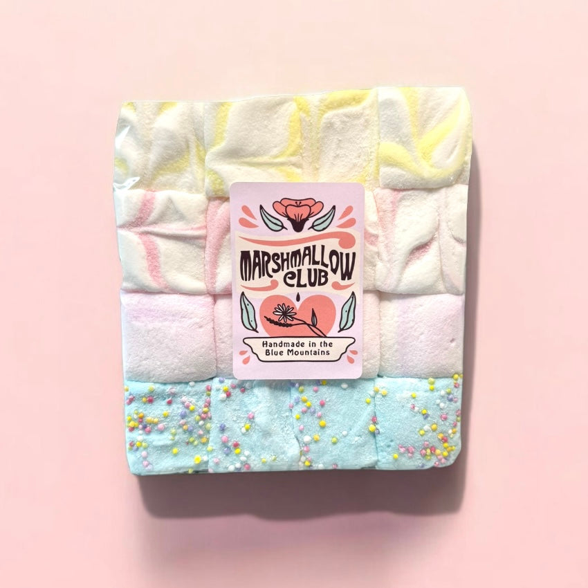 Pack of marshmallows with a Marshmallow Club label on a pink background